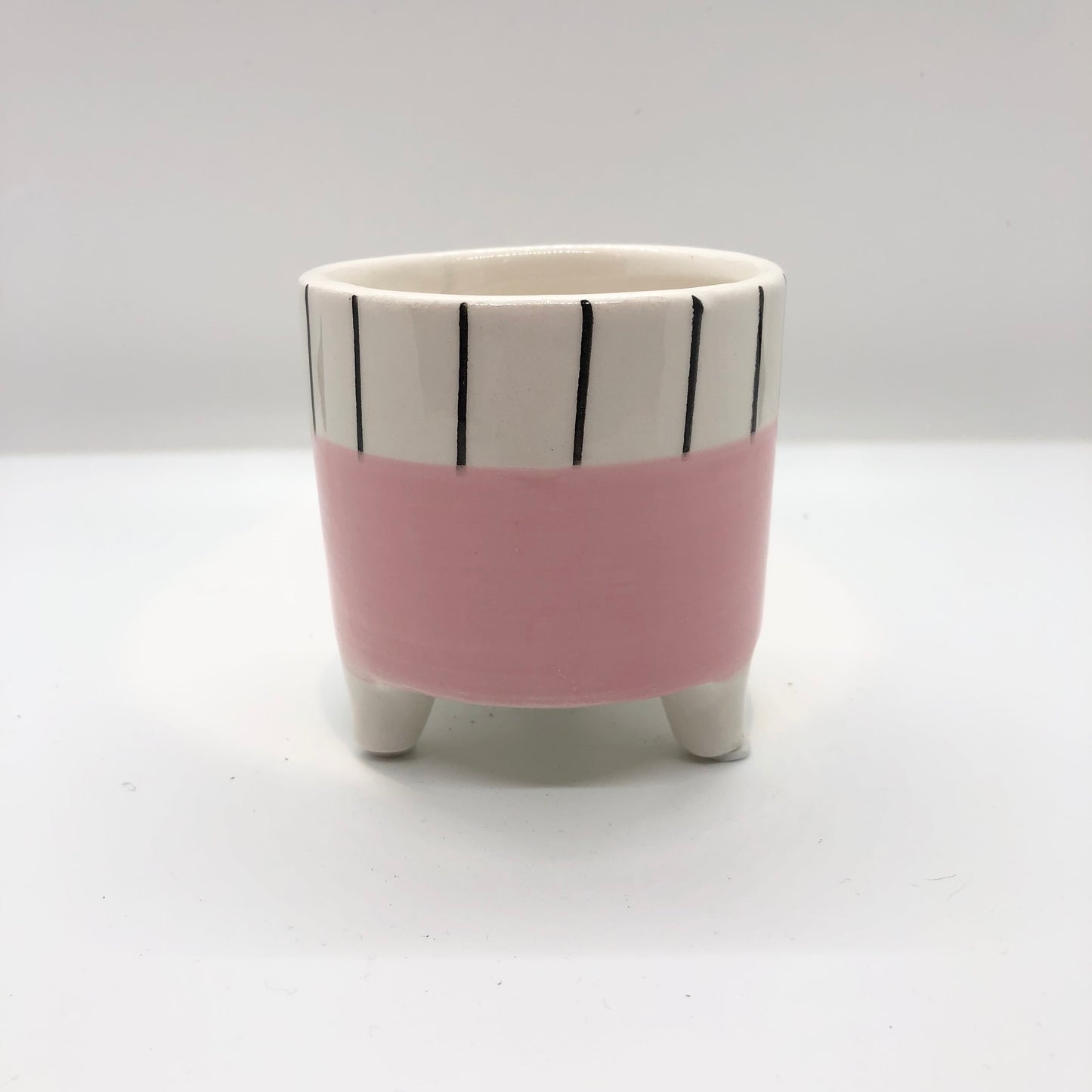 
                  
                    Footed Pink Dolomite with Black Striped Rim
                  
                