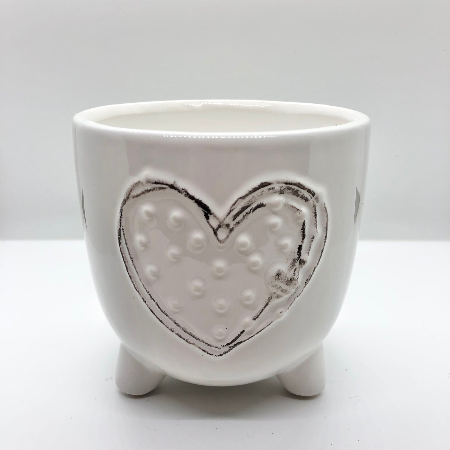 
                  
                    Footed White Dolomite Pot With Heart
                  
                