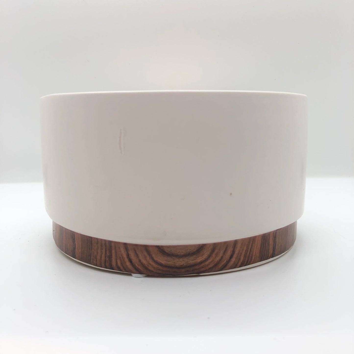 
                  
                    Matte White Dolomite Container with Woodgrain Effect
                  
                